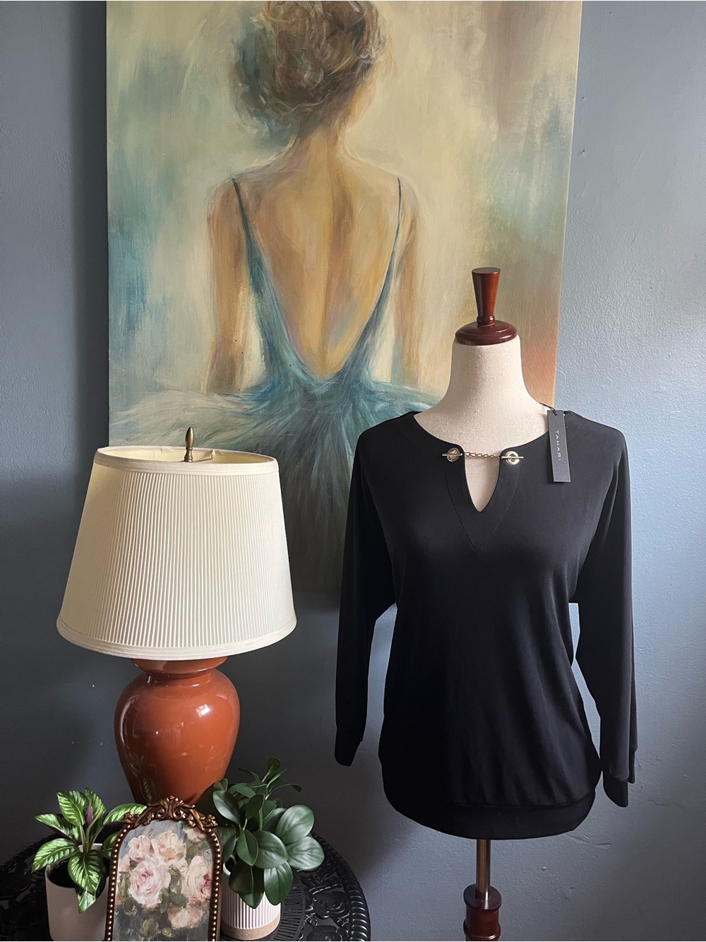 New with tags, Tahari size L, black blouse with gold toggle accent.